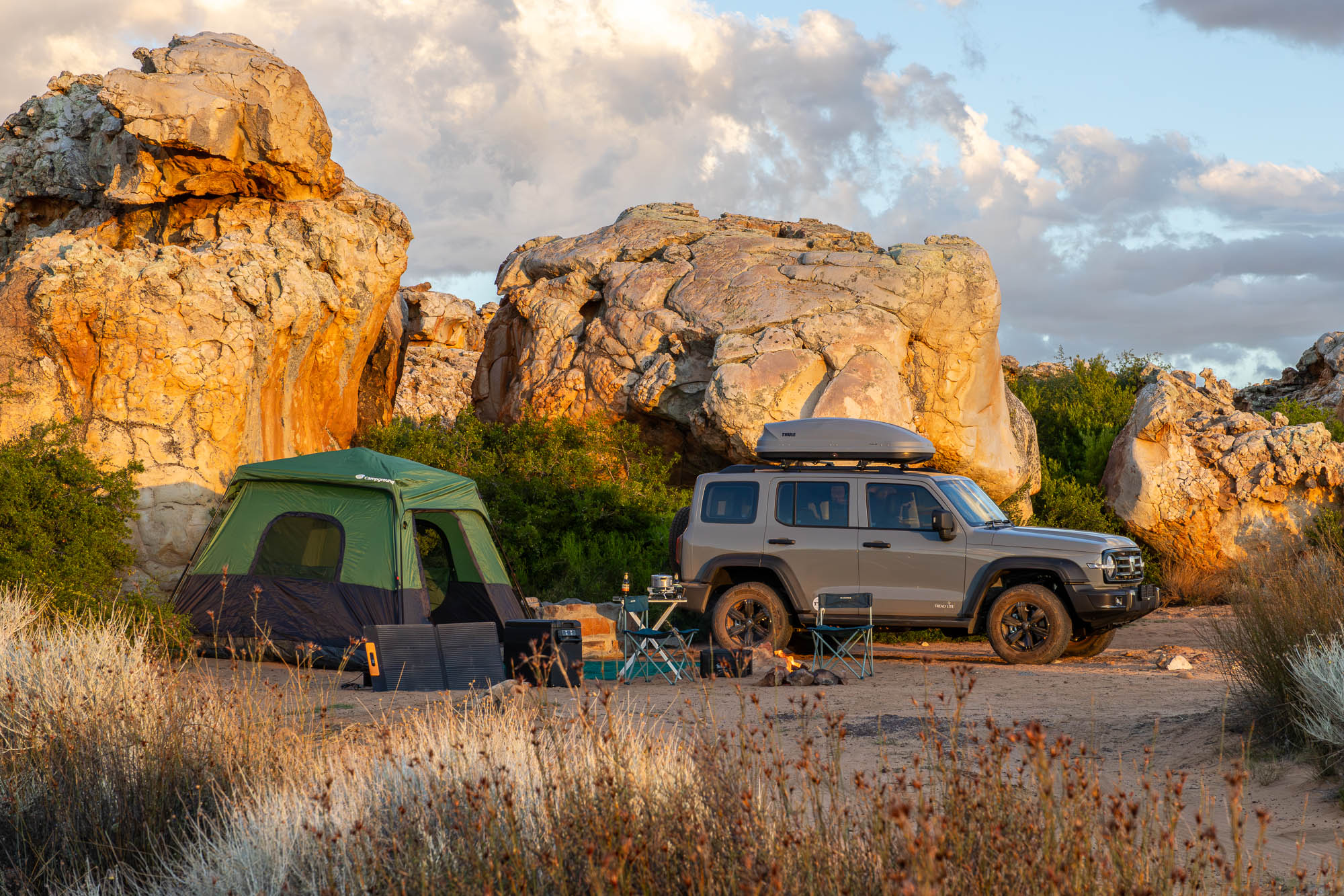 Family camping setup in our new GWM Tank 300 setup